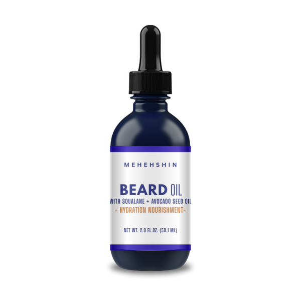 Bottle of MEHEHSHIN beard oil with a dropper on a white background