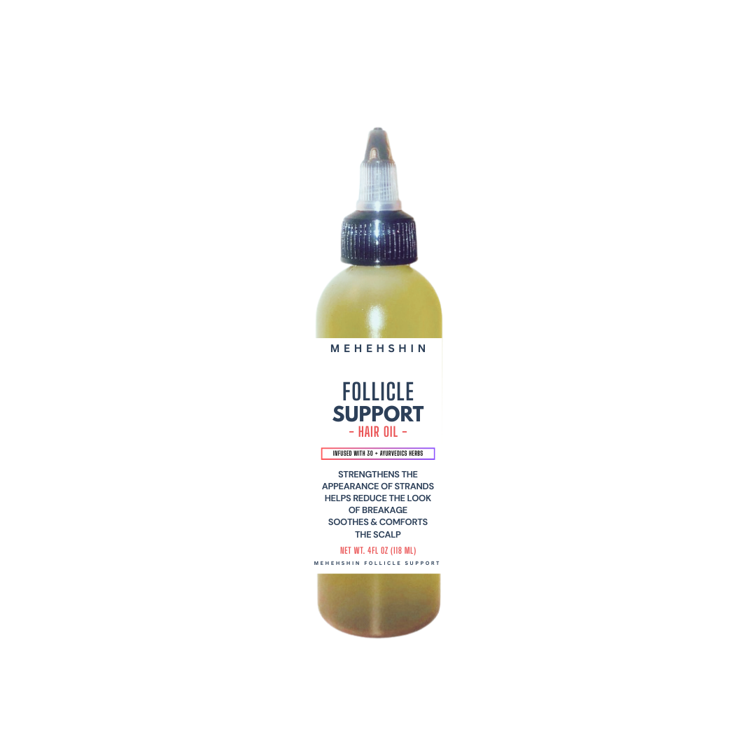 Bottle of Mehehshin Follicle Support Hair Oil on a white background